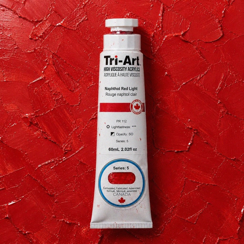 Tri-Art acrylic paint tube on a red textured background