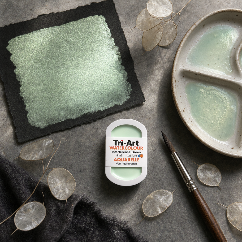 Tri-Art Watercolour pan Interference Green transparent Series 2 flat lay with iridescent swatch on slate