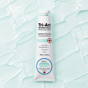 Tri-Art high viscosity acrylic paint tube on a textured light blue background